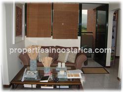 Alajuela condo, Alajuela real estate, Costa Rica condominium, parking, swimming pool, granite countertops, for sale, two bedroom, internet, Cable TV, new highway, 24/7 security, maintenance, gardens, 1079