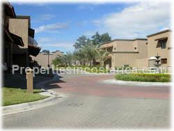 gated community, clubhouse, river, forest.