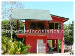 Pavones single family home, 2 story, Pavones for sale, beach access, Pavones town, concrete, construction, balcony, ocean view, rainforest, peninsula, turnkey, kitchen, dining, lounge, laundry, ready to move in, opportunity, affordable,1512