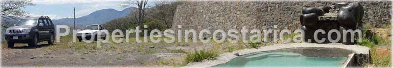 Orotina real estate, for sale, Orotina lot, mountain community, rock waterfall, pool with waterfall, Costa Rica mountain lot, residential lot, new highway, 1690 
