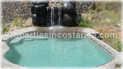 Orotina real estate, for sale, Orotina lot, mountain community, rock waterfall, pool with waterfall, Costa Rica mountain lot, residential lot, new highway, 1690 