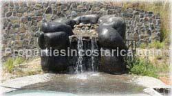 Orotina real estate, for sale, Orotina lot, mountain community, rock waterfall, pool with waterfall, Costa Rica mountain lot, residential lot, new highway, 1690 