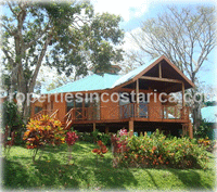 Gated community home in front of Arenal Lake for sale