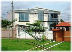 Cariari house for sale, Cariari real estate, modern home, golf area, cariari community, International schools, resort golf course, highway, malls, airport, 1606