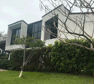 Industrial architectural style home with views to the mountains and city in a sought after gated community in Barreal, Heredia