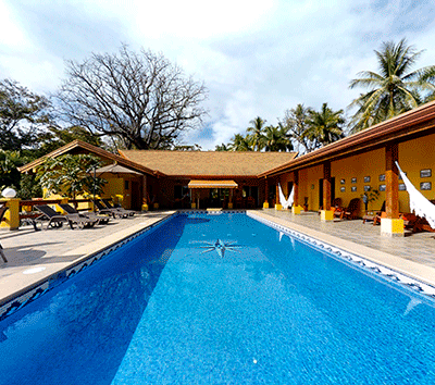 Turn-Key Ocean View Estate with Guest House and Short Walk to the Beach!